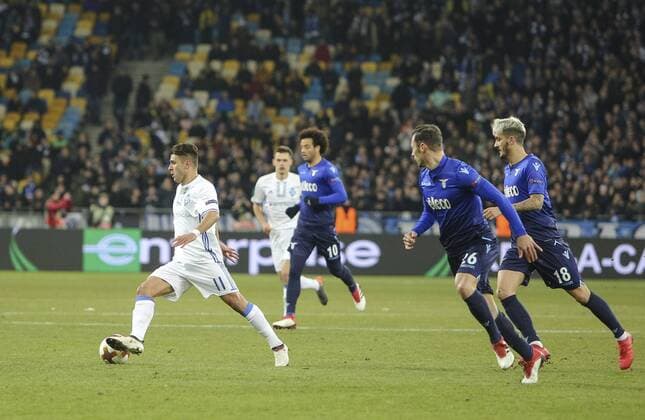 March 15, 2018 - Kiev, Ukraine - Dunamo Kyiv FC s Junior Moraes vies for a ball with S.S. Lazio FC s player Stefan Radu and S.S. Lazio FC s player Luis Alberto during the 2nd leg of Round 16 UEFA Europa League match at a NSC Olimpiyskyi in Kyiv, Ukraine, March 15, 2018. Dynamo Kiev v Lazio - UEFA Europa League Round of 16: Second Leg  - ZUMAn230 20180315_zaa_n230_346 Copyright: xSergiixKharchenkox