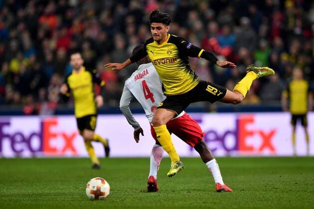 SOCCER - UEFA EL, RBS vs Dortmund SALZBURG,AUSTRIA,15.MAR.18 - SOCCER - UEFA Europa League, round of 16, Red Bull Salzburg vs Borussia Dortmund. Image shows Amadou Haidara (RBS) and Mahmoud Dahoud (Dortmund). GEPAxpictures xFlorianxErtl