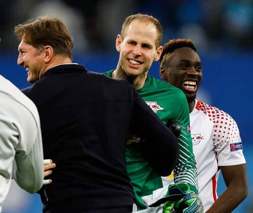 Bilder des Tages - SPORT March 15, 2018 - Saint Petersburg, Russia - (L to R) Head coach Ralph Hasenhuttl, Peter Gulacsi and Jean-Kevin Augustin of RB Leipzig celebrate a victory during the UEFA Europa League Round of 16 second leg match between FC Zenit St. Petersburg and RB Leipzig at Saint Petersburg Stadium on March 15, 2018 in Saint Petersburg, Russia. Zenit St Petersburg v RB Leipzig - UEFA Europa League Round of 16: Second Leg  - ZUMAn230 20180315_zaa_n230_430 Copyright: xMikexKireevx