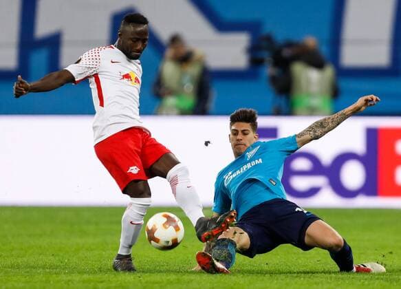 March 15, 2018 - Saint Petersburg, Russia - Emiliano Rigoni (R) of FC Zenit Saint Petersburg and Naby Keita of RB Leipzig vie for the ball during the UEFA Europa League Round of 16 second leg match between FC Zenit St. Petersburg and RB Leipzig at Saint Petersburg Stadium on March 15, 2018 in Saint Petersburg, Russia. Zenit St Petersburg v RB Leipzig - UEFA Europa League Round of 16: Second Leg  - ZUMAn230 20180315_zaa_n230_454 Copyright: xMikexKireevx