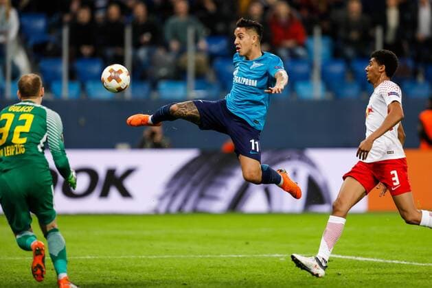 March 15, 2018 - Saint Petersburg, Russia - Sebastian Driussi (C) of FC Zenit Saint Petersburg scores a goal as Peter Gulacsi (L) and Bernardo of RB Leipzig defend during the UEFA Europa League Round of 16 second leg match between FC Zenit St. Petersburg and RB Leipzig at Saint Petersburg Stadium on March 15, 2018 in Saint Petersburg, Russia. Zenit St Petersburg v RB Leipzig - UEFA Europa League Round of 16: Second Leg  - ZUMAn230 20180315_zaa_n230_450 Copyright: xMikexKireevx
