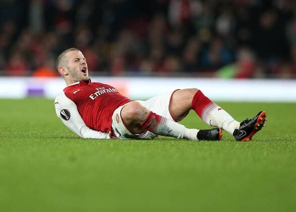 15th March 2018, Emirates Stadium, London, England; UEFA Europa League football, round of 16 second leg, Arsenal versus AC Milan; Jack Wilshere of Arsenal lying on the pitch injured after being fouled by Manuel Locatelli of AC Milan  ActionPlus12001871