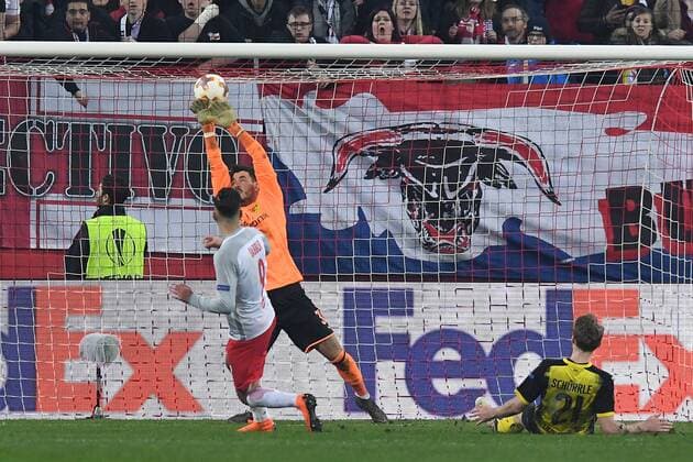 Football Europa League Round of 16 FC Salzburg Borussia Dortmund on 15 03 2018 at the Red Bull Arena in Salzburg Roman Bürki Dortmund behind Munas Dabbur Salzburg front xRx