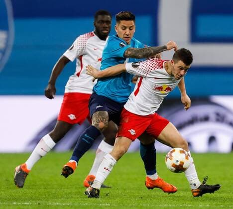 March 15, 2018 - Saint Petersburg, Russia - Sebastian Driussi (C) of FC Zenit Saint Petersburg vies for the ball with Diego Demme (R) of RB Leipzig during the UEFA Europa League Round of 16 second leg match between FC Zenit St. Petersburg and RB Leipzig at Saint Petersburg Stadium on March 15, 2018 in Saint Petersburg, Russia. Zenit St Petersburg v RB Leipzig - UEFA Europa League Round of 16: Second Leg  - ZUMAn230 20180315_zaa_n230_453 Copyright: xMikexKireevx