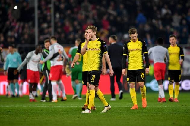 SOCCER - UEFA EL, RBS vs Dortmund SALZBURG,AUSTRIA,15.MAR.18 - SOCCER - UEFA Europa League, round of 16, Red Bull Salzburg vs Borussia Dortmund. Image shows the disappointment of Sokratis Papastathopoulos, Andre Schuerrle, Lukasz Piszczek (Dortmund) and the rejoicing of RBS. GEPAxpictures xFlorianxErtl