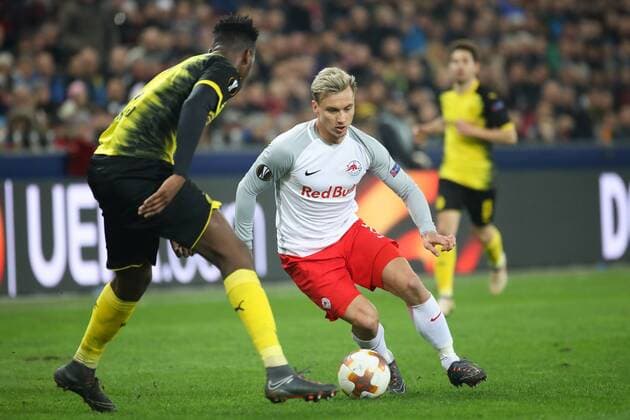 SOCCER - UEFA EL, RBS vs Dortmund SALZBURG,AUSTRIA,15.MAR.18 - SOCCER - UEFA Europa League, round of 16, Red Bull Salzburg vs Borussia Dortmund. Image shows Dan Axel Zagadou (Dortmund) and Fredrik Gulbrandsen (RBS). GEPAxpictures xChristianxWalgram