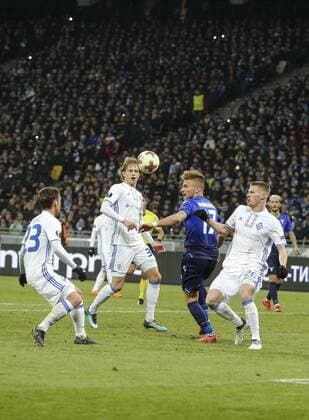 March 15, 2018 - Kiev, Ukraine - S.S. Lazio FC s player Ciro Immobile fights for a ball with Dynamo Kyiv FC s Mykyta Burda and Dynamo Kyiv FC s Artem Shabanov during the 2nd leg of Round 16 UEFA Europa League match at a NSC Olimpiyskyi in Kyiv, Ukraine, March 15, 2018. Dynamo Kiev v Lazio - UEFA Europa League Round of 16: Second Leg  - ZUMAn230 20180315_zaa_n230_533 Copyright: xSergiixKharchenkox
