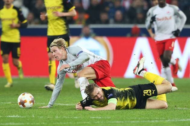 SOCCER - UEFA EL, RBS vs Dortmund SALZBURG,AUSTRIA,15.MAR.18 - SOCCER - UEFA Europa League, round of 16, Red Bull Salzburg vs Borussia Dortmund. Image shows Xaver Schlager (RBS) and Marcel Schmelzer (Dortmund). GEPAxpictures xMathiasxMandl