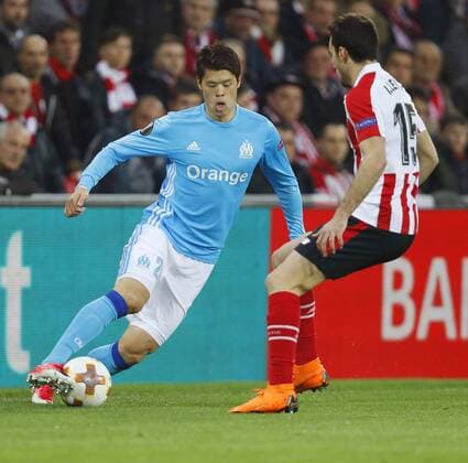 Football: Marseille s Sakai Marseille defender Hiroshi Sakai attempts to dribble past Inigo Lekue of Athletic Bilbao during the first half of their Europa League match on March 15, 2018, in Bilbao, Spain. 