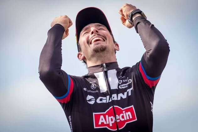 - ROUBAIX, FRANCE: German John Degenkolb of Team Giant-Alpecin celebrates on the podium after the Paris-Roubaix one day cycling race, 253,5 km from Compiegne to the Velodrome in Roubaix, Sunday 12 April 2015. LUCxCLAESSEN  x78197212x