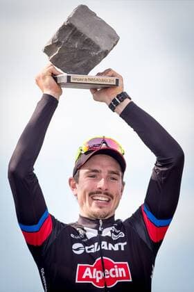 - ROUBAIX, FRANCE: German John Degenkolb of Team Giant-Alpecin celebrates on the podium after the Paris-Roubaix one day cycling race, 253,5 km from Compiegne to the Velodrome in Roubaix, Sunday 12 April 2015. LUCxCLAESSEN  x78198828x