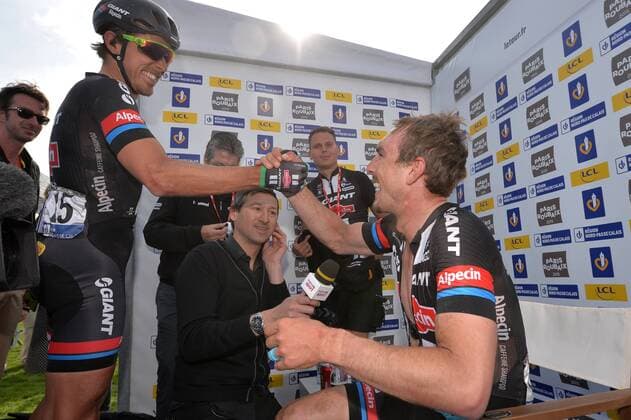 - ROUBAIX, FRANCE: German John Degenkolb of Team Giant-Alpecin and Dutch Ramon Sinkeldam of Team Giant-Alpecin celebrates after the Paris-Roubaix one day cycling race, 253,5 km from Compiegne to the Velodrome in Roubaix, Sunday 12 April 2015. POOLxPAPONxL EQUIPE  x78198951x