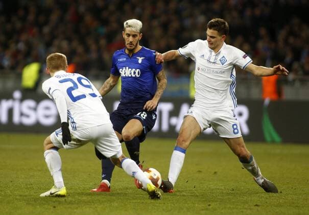 March 15, 2018 - Luis Alberto (C) of Lazio vies for the ball with Volodymyr Shepeliev (R) and Vitaliy Buyalskiy (L) of Dynamo during the Europa League round 16 second leg football match between FC Dynamo Kyiv and SS Lazio, at the Olimpiyskyi stadium in Kyiv, Ukraine, March 15, 2018. Europa League round 16 second leg football match between FC Dynamo Kyiv and SS Lazio - ZUMAs334 82331937st Copyright: xAnatoliixStepanovx