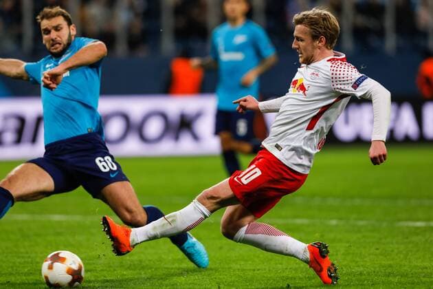 March 15, 2018 - Saint Petersburg, Russia - Branislav Ivanovic (L) of FC Zenit Saint Petersburg defends as Emil Forsberg of RB Leipzig passes the ball during the UEFA Europa League Round of 16 second leg match between FC Zenit St. Petersburg and RB Leipzig at Saint Petersburg Stadium on March 15, 2018 in Saint Petersburg, Russia. Zenit St Petersburg v RB Leipzig - UEFA Europa League Round of 16: Second Leg  - ZUMAn230 20180315_zaa_n230_708 Copyright: xMikexKireevx