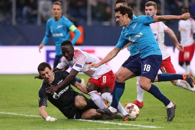 March 15, 2018 - Saint Petersburg, Russia - Andrei Lunev (L), Yuri Zhirkov of FC Zenit Saint Petersburg and Naby KeÃ¯ta (C) of RB Leipzig vie for the ball during the UEFA Europa League Round of 16 2nd leg football match between FC Zenit Saint Petersburg and RB Leipzig at Saint Petersburg Stadium. FC Zenit Saint Petersburg vs RB Leipzig UEFA Europa League Round of 16 2nd leg football match in Saint Petersburg, Russia - 15 Mar 2018 - ZUMAs197 82335107st Copyright: xIgorxRussakx