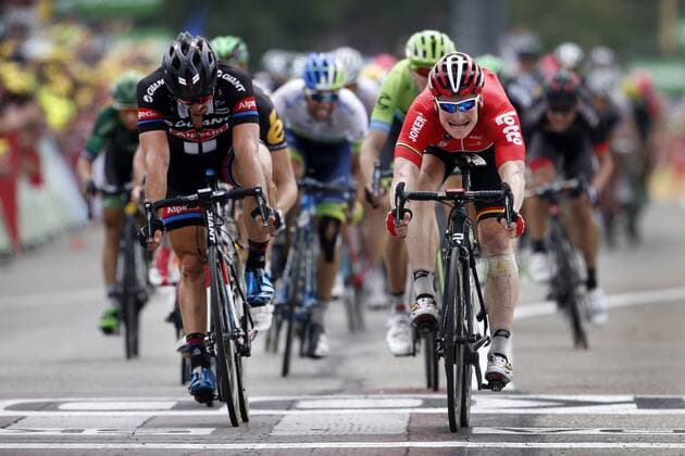 - VALENCE, FRANCE: German Andre Greipel of Lotto - Soudal wins before 81 German John Degenkolb of Team Giant-Alpecin (L) during stage 14 of the 2015 edition of the Tour de France cycling race, 183 km from Mende to Valence, France, Sunday 19 July 2015. This year s Tour de France is taking place from 4 to 26 July. YUZURUxSUNADA  x83006698x