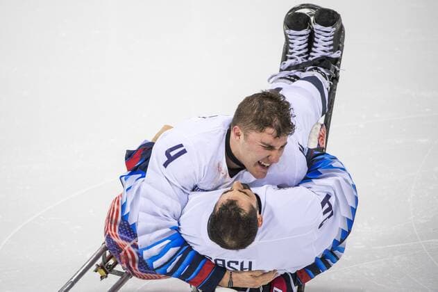March 26, 2018 - Pyeongchang, South Korea - Brody ROYBAL (USA) and Steve CASH (USA) celebrate winning the gold medal over Canada in the Ice hockey Eishockey gold medal game between Canada and United States during day nine of the PyeongChang 2018 Paralympic Games on March 18, 2018 in Gangneung, South Korea. USA v Canada - Paralympic Games - Ice Hockey gold medal match  - ZUMAn230 20180326_zaa_n230_001 Copyright: xMauroxUjettox
