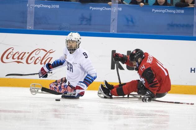 March 26, 2018 - Pyeongchang, South Korea - Steve ARSENAULT (CAN) and Travis DODSON (USA) during The Ice hockey Eishockey gold medal game between Canada and United States during day nine of the PyeongChang 2018 Paralympic Games on March 18, 2018 in Gangneung, South Korea. USA v Canada - Paralympic Games - Ice Hockey gold medal match  - ZUMAn230 20180326_zaa_n230_049 Copyright: xMauroxUjettox