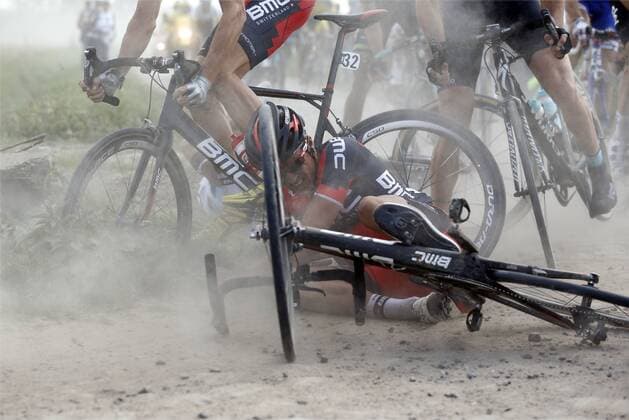 - ROUBAIX, FRANCE: Belgian Greg Van Avermaet of BMC Racing Team (C) falls during the hundred and twelfth edition of Paris-Roubaix one day classic cycling race, 257 km from Compiegne to Roubaix, France, Sunday 13 April 2014. YUZURUxSUNADA  x56990654x