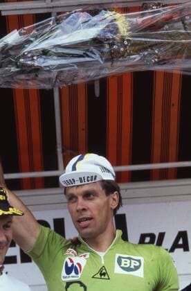 - ALENCON, FRANCE: (FILE) File picture dated 05 July 1984 shows Belgian Frank Hoste (Panasonic) celebrating on the podium in the green jersey after stage 6 in the Tour de France cycling race between Cergy Pontoise and Alencon. BELGAxARCHIVES  x60028962x