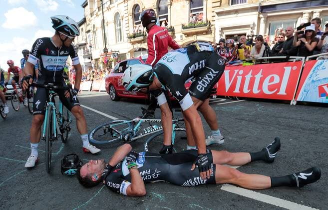 - HARROGATE, UNITED KINGDOM: British Mark Cavendish of team Omega Pharma - Quick Step is injured after a crash at the arrival of the first stage of the 101st edition of the Tour de France cycling race, 190,5 km from Leeds to Harrogate, United Kingdom on Saturday 05 July 2014. POOLxFREDxMONS  x60062791x