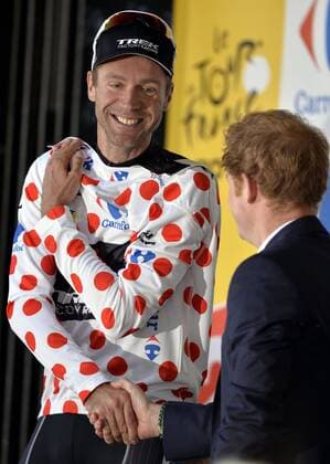- HARROGATE, UNITED KINGDOM: Britain s Prince Harry congratulates German Jens Voigt of Trek Factory Racing with the polkadot jersey for best climber after the first stage of the 101st edition of the Tour de France cycling race, 190,5 km from Leeds to Harrogate, United Kingdom on Saturday 05 July 2014. ERICxLALMAND  x60064062x