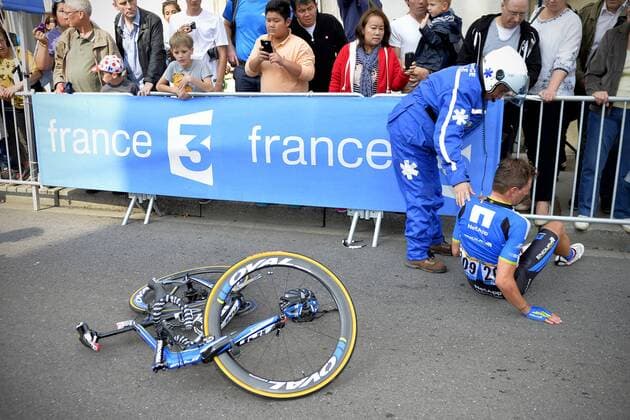 - NANCY, FRANCE: German Paul Voss of Team NetApp-Endura after a fall during stage 7 of the 101st edition of the Tour de France cycling race, 234,5 km from Epernay to Nancy, on Friday 11 July 2014. DAVIDxSTOCKMAN  x60207719x