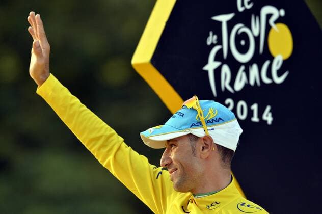 - PARIS, FRANCE: Italian Vincenzo Nibali of Astana Pro Team wearing the yellow jersey of leader in the overall ranking after the last stage of the 101st edition of the Tour de France cycling race, 137,5km from Evry to Paris Champs-Elysees, France, on Sunday 27 July 2014. ERICxLALMAND  x60620006x