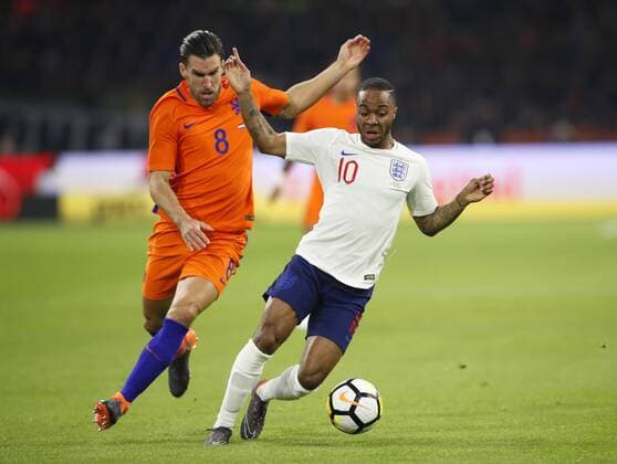 Netherland s Kevin Strootman tussles with England s Raheem Sterling during the International Friendly Länderspiel match at the Amsterdam Arena, Amsterdam. Picture date: March 23rd 2018. Picture credit should read: David Klein Sportimage EDITORIAL USE ONLY. No use with unauthorised audio, video, data, fixture lists, club league logos or live services. Online in-match use limited to 120 images, no video emulation. No use in betting, games or single club league player publications.