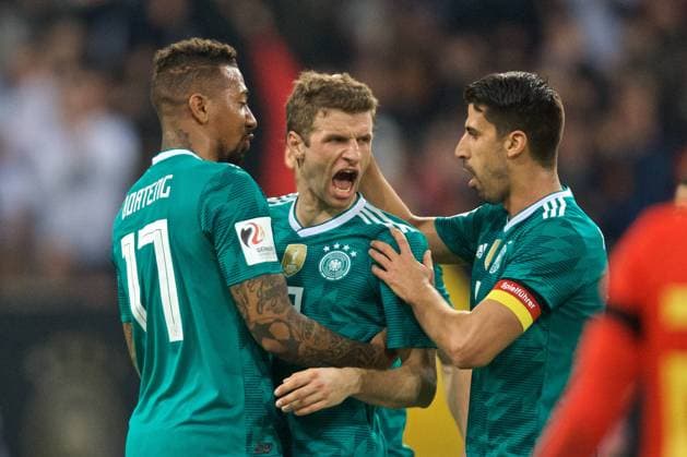 Soccer Dusseldorf 23 03 2018 Internationals DFB National Team Friendly Match Germany GER Spain ESP 1 1 Jubilation after goal to 1 1 by Thomas Müller Germany No 13 Muller Mueller Jerome Boateng Germany No 17 li Sami Khedira Germany No 06 re
