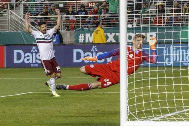 SANTA CLARA, CA - MARCH 23: Iceland Goalkeeper Runar Alex Runarsson (24) unable to stop the shot from Mexico Defender Miguel Layun (7) from outside the box during the second half of the international match Länderspiel between Mexico and Iceland on Friday, March 23, 2018 at Levi s Stadium in Santa Clara, CA. Final Score: Mexico-3, Iceland-0. (Photo by Allan Hamilton Icon Sportswire) SOCCER: MAR 23 Mexico v Iceland Icon18032327 EDITORIAL USE ONLY