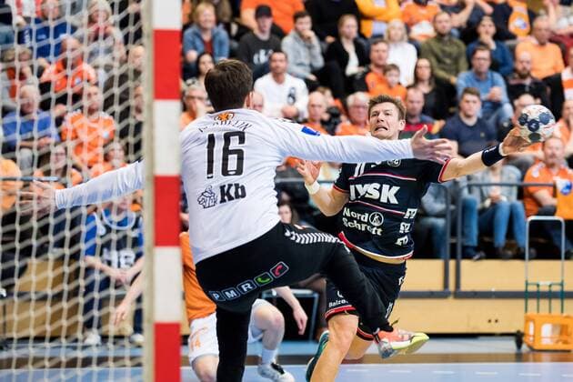 180324 Flensburgs Simon Jeppsson and Kristianstads blacksmith Richard Kappelin during the Champions League match between Kristianstad and Flensburg on March 24, 2018 in Kristianstad  Copyright: AvdoxBilkanovic BB180324AB021