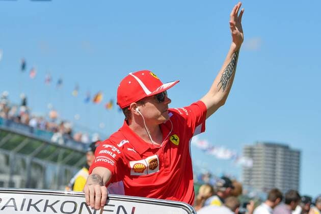 March 25, 2018: Kimi Raikkonen (FIN) 7 from the Scuderia Ferrari team waves to the crowd during the drivers parade at the 2018 Australian Formula One Grand Prix at Albert Park, Melbourne, Australia. Cal Media Formula One 2018: Australia - Race - ZUMAc04_ 20180325_zaf_c04_023 Copyright: xSydneyxLowx