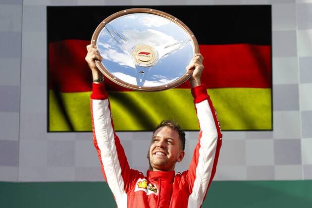 Bilder des Tages - SPORT Motorsports: FIA Formula One World Championship WM Weltmeisterschaft 2018, Melbourne, Victoria : Motorsports: Formula 1 2018 Rolex Australian Grand Prix, VETTEL Sebastian (ger), Scuderia Ferrari SF71H, portrait podium during 2018 Formula 1 championship at Melbourne, Australian Grand Prix, Melbourne Australia