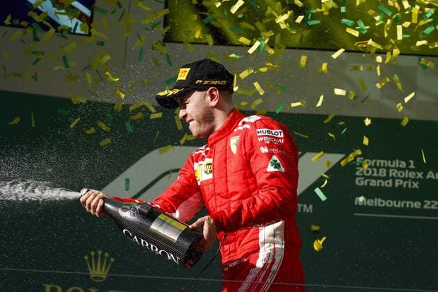 Motorsports: FIA Formula One World Championship WM Weltmeisterschaft 2018, Melbourne, Victoria : Motorsports: Formula 1 2018 Rolex Australian Grand Prix, VETTEL Sebastian (ger), Scuderia Ferrari SF71H, portrait podium during 2018 Formula 1 championship at Melbourne, Australian Grand Prix, Melbourne Australia