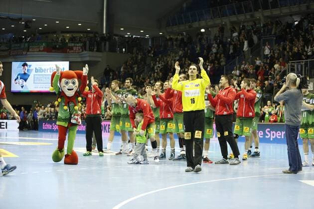 Magdeburg rejoicing over the victory cheering after the game handball EHC Cup SC Magdeburg SKA Minsk xtgx