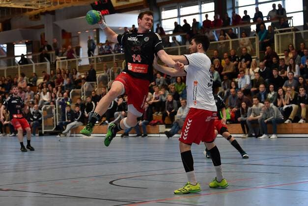 25 03 2018 Handball League Season 2017 2018 3 League Men HC Erlangen HCE II HSC Bad Neustadt Florian Wagner 14 HC Erlangen II Adam Pal 19 HSC Bad Neustadt right