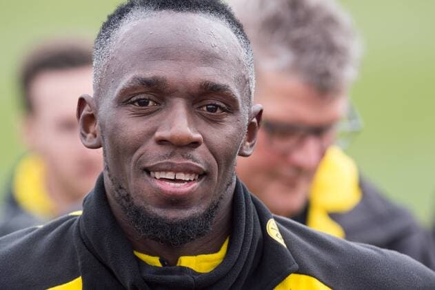 Usain BOLT ehem Athletics professional answers the media questions after the interview Interview TV Interview Television Cameras Press Portraits Portrait Portrait Close up Football 1 Bundesliga training Borussia Dortmund DO am 23 03 2018 in Dortmund Germany Â