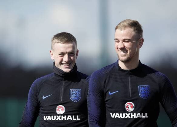 England s Jordan Pickford and Joe Hart during training at the Tottenham Hotspur Training Centre, London. Picture date: March 26th 2018. Picture credit should read: David Klein Sportimage EDITORIAL USE ONLY. No use with unauthorised audio, video, data, fixture lists, club league logos or live services. Online in-match use limited to 120 images, no video emulation. No use in betting, games or single club league player publications.