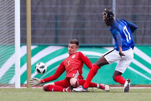 Germany France Soccer U18 Laenderspiel Markranstädt 26 03 2018 Stadion am Bad Soccer U18 Internationals GERMANY GER vs France FRA Pictured Goal for France Charles Abi 17 FRA to 1 1 v l Goalkeeper Christian Früchtl 1 GER B Munich and Charles Abi 17 FRA
