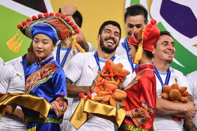 Players of Uruguay national football team take part in the champion award ceremony for the 2018 Gree China Cup International Football Championship in Nanning city, south China s Guangxi Zhuang Autonomous Region, 26 March 2018. Uruguay won the final by 1-0 against Wales and claimed the title of the event. Uruguay claims title of 2018 China Cup Int l Football Championship in Nanning  20180326_10274