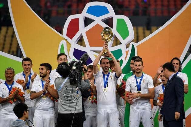 Players of Uruguay national football team take part in the champion award ceremony for the 2018 Gree China Cup International Football Championship in Nanning city, south China s Guangxi Zhuang Autonomous Region, 26 March 2018. Uruguay won the final by 1-0 against Wales and claimed the title of the event. Uruguay claims title of 2018 China Cup Int l Football Championship in Nanning  20180326_29952