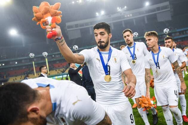 Players of Uruguay national football team take part in the champion award ceremony for the 2018 Gree China Cup International Football Championship in Nanning city, south China s Guangxi Zhuang Autonomous Region, 26 March 2018. Uruguay won the final by 1-0 against Wales and claimed the title of the event. Uruguay claims title of 2018 China Cup Int l Football Championship in Nanning  20180326_53431