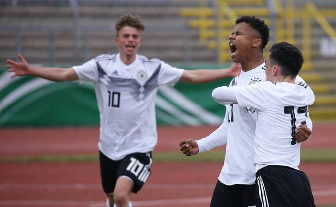 Ulm football U 16 international match Germany vs Italy from left Marvin White Karim Adeyemi Paul Nebel GER cheering