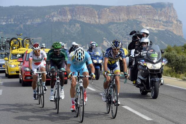 - NICE, FRANCE: Japanese Yukiya Arashiro of Team Europcar, French Kevin Reza of Team Europcar, Kazakh Alexey Lutsenko of Pro Team Astana and Belgian Thomas De Gendt of team Vacansoleil-DCM pictured during the fifth stage of the 100th edition of the Tour de France cycling race, 228,5km from Cagnes-sur-Mer to Marseille, France, on Wednesday 03 July 2013. DIRKxWAEM  x44479075x
