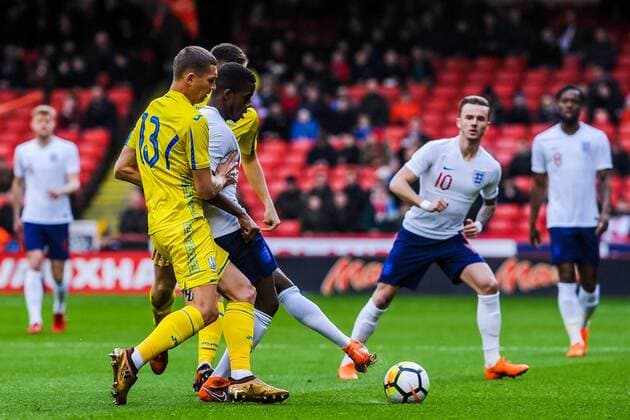 Fulham s midfielder Ryan Sessegnon (11) for England U21 U 21 s under pressure from ?Valencia CF Mestalla s defender Ivan Zotko (13) for Ukraine U21 s during the International Euro U21 Qualification match between England U21 and Ukraine U21 at Bramall Lane, Sheffield, England on 27 March 2018. Copyright: xStephenxBuckleyx PMI-1923-0001
