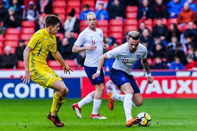 ?Norwich City s forward James Maddison (10) for England U21 U 21 s turns ?FC Shakhtar Donetsk s midfielder Oleksandr Pikhalyonok (20) for Ukraine U21 s during the International Euro U21 Qualification match between England U21 and Ukraine U21 at Bramall Lane, Sheffield, England on 27 March 2018. Copyright: xStephenxBuckleyx PMI-1923-0003