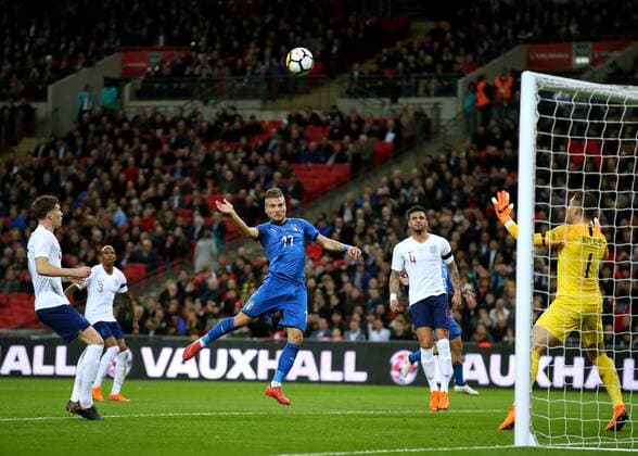 27th March 2018, Wembley Stadium, London, England; International Football Friendly, England versus Italy; Ciro Immobile of Italy with a header but goes over the goal  ActionPlus12006066