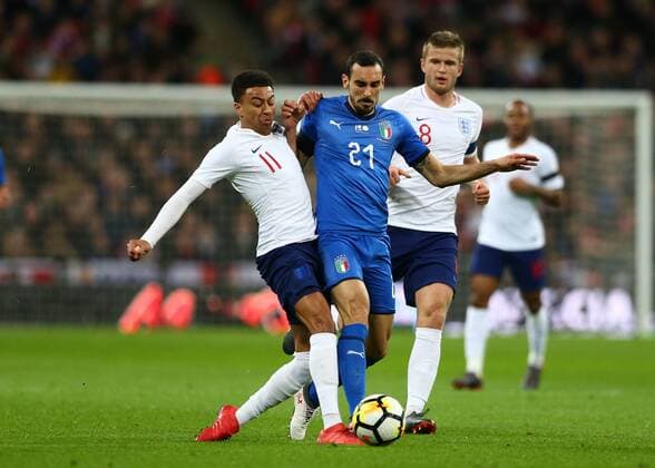 27th March 2018, Wembley Stadium, London, England; International Football Friendly, England versus Italy; Jesse Lingard of England puts pressure on Davide Zappacosta of Italy  ActionPlus12006069