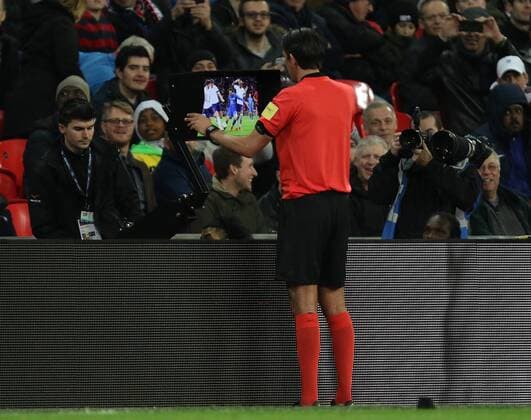 Referee Deniz Aytekin refers to VAR before giving a penalty at the England v Italy International Friendly Länderspiel football match, at Wembley Stadium, London, on March 27, 2018. **This picture is for editorial use only** 